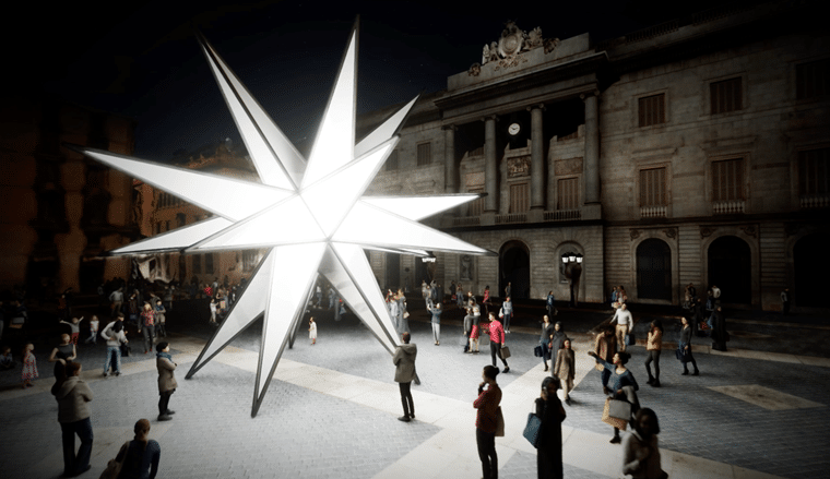 La plaza Sant Jaume se convierte este año en un verdadero epicentro de la Navidad en Barcelona, gracias a una propuesta innovadora que combina tradición e innovación. La instalación de una espectacular estrella luminosa de 20 puntas, llamada "Origen", será el centro de atención de la plaza, mientras que dos pesebres, situados en el interior del Ayuntamiento y del Palau de la Generalitat, complementarán la decoración navideña. Este proyecto, fruto de la colaboración entre el Ayuntamiento de Barcelona y la Generalitat de Catalunya, promete ofrecer una experiencia única para ciudadanos y visitantes.

Una estrella monumental como símbolo de perfección
La estrella "Origen" no es solo una pieza decorativa; es una obra de arte que destaca por su diseño y significado. Creada por Xevi Bayona y Àlex Posada, la estrella representa un icosaedro, una figura geométrica de 20 caras triangulares que simboliza perfección, armonía y equilibrio. Este diseño geométrico también evoca conceptos universales, como el momento germinal del universo, conocido como el Big Bang, cuando la oscuridad se transformó en luz y energía.

Con un diámetro de nueve metros y un peso de 2,5 toneladas, la estrella está fabricada con hierro, metacrilato y tecnología LED, lo que garantiza tanto su durabilidad como su espectacularidad visual. Durante el día, esta obra se presenta como una imponente escultura geométrica en el lateral de la plaza, cerca de las calles Ferran y del Call. Sin embargo, es al anochecer cuando despliega todo su potencial: se convierte en un faro luminoso que proyecta reflejos de luz sobre las fachadas del Ayuntamiento y del Palau de la Generalitat.

Además, la instalación cuenta con una banda sonora original que añade un componente sensorial al espectáculo, haciendo que la experiencia sea aún más inmersiva y cautivadora.

Dos pesebres para honrar la tradición navideña
La decoración de la plaza Sant Jaume no estaría completa sin los tradicionales pesebres, que este año se han trasladado al interior de los edificios históricos para enriquecer la experiencia de los visitantes. El Pati de Carruatges del Ayuntamiento acogerá el pesebre tradicional, elaborado por la Associació de Pessebristes. Este diorama incluirá referencias al centenario del poeta Joan Salvat-Papasseit, quien trabajó en el Moll de la Fusta, y a la reciente edición de la Copa América de vela en Barcelona. La exposición estará abierta al público del 29 de noviembre al 5 de enero, ofreciendo una oportunidad única para disfrutar de esta emblemática tradición en un entorno singular.

Por su parte, el Palau de la Generalitat abrirá sus puertas entre el 14 y el 20 de diciembre para mostrar su decoración navideña. Los visitantes podrán descubrir un pesebre, un tió y avetos decorados, ambientados con un estilo que combina tradición y modernidad. Esta iniciativa no solo fomenta el espíritu navideño, sino que también permite a la ciudadanía explorar espacios habitualmente reservados.

Colaboración entre instituciones para una Navidad especial
El proyecto de decoración de la plaza Sant Jaume es el resultado de una estrecha colaboración entre el Ayuntamiento y la Generalitat, que han trabajado juntos para ofrecer una propuesta unificada y coherente. Ambas instituciones también han compartido la misma ornamentación vegetal en los balcones de sus edificios, reforzando la idea de cohesión.

El coste total de la estrella luminosa asciende a 145.000 euros, mientras que el pesebre del Ayuntamiento ha supuesto una inversión adicional de 50.000 euros. Aunque el Ayuntamiento ha asumido la mayor parte del gasto, el concejal Jordi Marcé destacó la importancia de esta colaboración: "Estamos agradecidos de que la Generalitat nos haya apoyado en una iniciativa que siempre ha sido del Ayuntamiento. Esto refuerza el compromiso de ambas instituciones con la Navidad y con la ciudad de Barcelona."

Una instalación con visión de futuro
La estrella "Origen" no está concebida como una decoración efímera. Tanto el Ayuntamiento como la Generalitat han dejado abierta la posibilidad de reutilizar esta monumental pieza en futuras ediciones, consolidándola como un símbolo navideño de Barcelona. Este enfoque no solo busca maximizar el impacto de la inversión, sino también establecer un vínculo emocional con los ciudadanos, que podrán disfrutar de esta obra año tras año.

Polémica y tradición en Sant Jaume
La decoración navideña de la plaza Sant Jaume siempre ha sido objeto de debate, especialmente en torno a los pesebres. El traslado del pesebre al interior del Ayuntamiento y la Generalitat ha generado opiniones divididas, pero las instituciones han defendido la decisión como una forma de enriquecer la experiencia navideña. Según Marcé, "reubicamos las piezas para aprovechar al máximo el espacio y ofrecer una propuesta artística más completa."

La estrella luminosa y los dos pesebres no solo buscan embellecer la plaza, sino también reforzar el mensaje de unidad y colaboración entre las instituciones. Además, el diseño y la ubicación de la estrella fueron seleccionados para resaltar el carácter icónico de Sant Jaume como punto de encuentro entre tradición e innovación.

Sant Jaume, el corazón de la Navidad en Barcelona
Con estas iniciativas, la plaza Sant Jaume se consolida como uno de los principales puntos de interés navideño en Barcelona. La combinación de una monumental estrella luminosa, dos pesebres emblemáticos y una decoración coherente en toda la plaza crea un entorno mágico que invita a barceloneses y turistas a sumergirse en el espíritu de las fiestas.

Sant Jaume no solo es un espacio de celebración, sino también un símbolo de la capacidad de Barcelona para combinar tradición y modernidad, demostrando que la Navidad puede ser un momento para innovar sin perder de vista las raíces culturales de la ciudad.